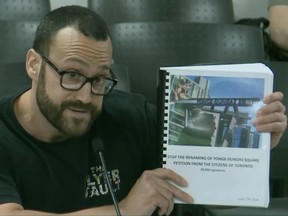 Man holds up petition