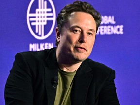 Tesla CEO Elon Musk speaks at the 27th annual Milken Institute Global Conference at the Beverly Hilton in Los Angeles, May 6, 2024.