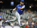 Blue Jays’ Yusei Kikuchi throws out a runner at first base in the fifth inning against the Brewers at American Family Field in Milwaukee last night. Getty Images