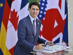 Prime Minister Justin Trudeau attends a welcome ceremony on the first day of the 50th G7 summit at Borgo Egnazia in Fasano, Italy, Thursday, June 13, 2024.