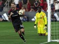 D.C. United midfielder Mateusz Klich (left) celebrates after his goal against Toronto FC during the second half at Audi Field in Washington, Saturday, June 1, 2024.