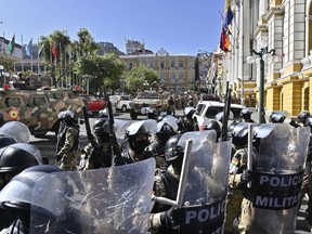 Military troops are deployed at the Plaza de Armas in La Paz, Bolivia, Wednesday, June 26, 2024. Bolivian President Luis Arce denounced the unauthorized gathering of soldiers and tanks outside government buildings in La Paz, saying "democracy must be respected."