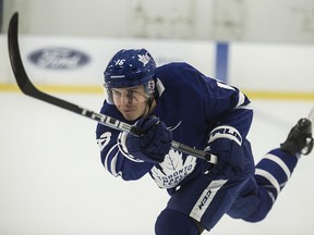 Maple Leafs winger Mitch Marner shoots the puck.