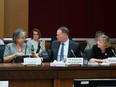 Senator Frances Lankin, left to right, David McGunity, chair of the National Security and Intelligence Committee of Parliamentarians, and Rennie Marcoux Executive Director of secretariat of National Security of Parliamentarians appear before the Senate National Security Committee in Ottawa on Monday June 10, 2019.