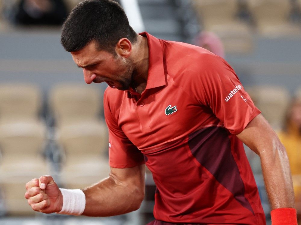 Novak Djokovic keeps his French Open title defence with win in 5 sets