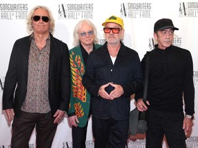 From left to right: Peter Buck, Mike Mills, Michael Stipe and Bill Berry, of R.E.M., attend the 2024 Songwriters Hall of Fame Induction and Awards Gala at New York Marriott Marquis Hotel on June 13, 2024 in New York City.
