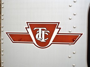 The TTC logo on a subway train.