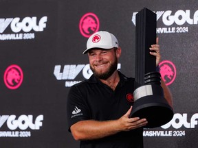 Tyrrell Hatton of Legion XIII poses with the individual victory trophy during day three of the LIV Golf Invitational - Nashville at The Grove on June 23, 2024 in College Grove, Tenn.