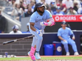 Blue Jays batter Vladimir Guerrero Jr. hits a single against the Pirates during third inning MLB action at Rogers Centre in Toronto, Saturday, June 1, 2024.