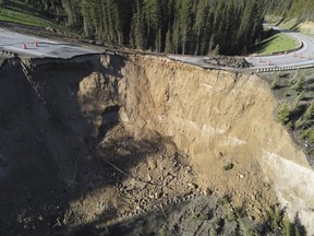 This photo provided by the Wyoming Highway Patrol shows a damaged section of Teton Pass near Jackson, Wyo., on Saturday, June 8, 2024.