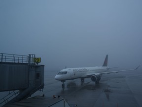 The union representing Air Canada pilots says it plans to ask that a federal conciliator be assigned to assist in contract negotiations with the airline. An Air Canada plane taxis towards the gate in poor weather conditions at Halifax Airport, in Halifax, Wednesday, March 27, 2024.