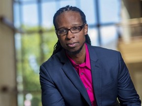 In this undated photo provided by American University, Ibram X. Kendi, author of "Antiracist Baby," poses for a portrait.
