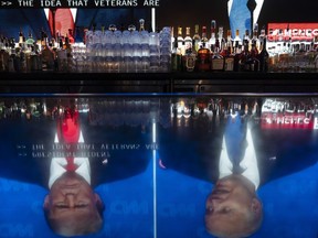 Botol minuman keras diletakkan di bar belakang Abbey Food & Bar di West Hollywood, California, Kamis, 27 Juni 2024, saat debat presiden antara Presiden Joe Biden dan calon presiden dari Partai Republik, mantan Presiden Donald Trump, disiarkan.
