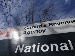 The Canada Revenue Agency says it is ramping up efforts to claw back overpayments of pandemic-related benefits. The Canada Revenue Agency sign outside the National Headquarters at the Connaught Building in Ottawa is seen on Monday, March 1, 2021.