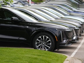 FILE - Vehicles sit in a row outside a dealership, June 2, 2024, in Lone Tree, Colo. Car dealerships across North America have faced a major disruption this week. CDK Global, a company that provides software for thousands of auto dealers in the U.S. and Canada, was hit by back-to-back cyberattacks on Wednesday, June 19, 2024.