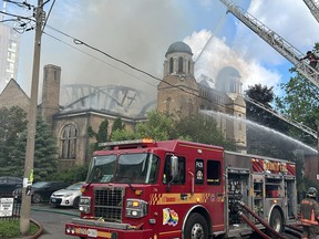 Toronto Fire crews battle a four-alarm blaze.