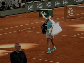 Spain's Rafael Nadal leaves the court after losing against Germany's Alexander Zverev during their first round match of the French Open tennis tournament at the Roland Garros stadium in Paris, Monday, May 27, 2024.
