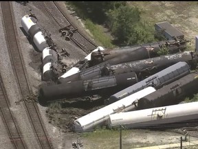 Train cars are piled up after a derailment on Thursday, June 27, 2024 in Matteson, Ill. Emergency officials ordered an evacuation after a freight train derailed in suburban Chicago. No injuries have been reported. (WLS via AP)
