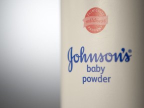 Johnson & Johnson baby powder is arranged for a photograph in New York, U.S., on Friday, July 15, 2011.