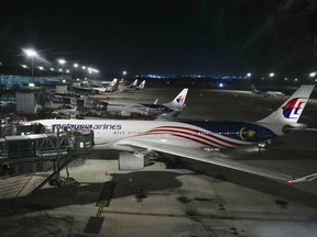 A Malaysia airlines plane parked at Kuala Lumpur International Airport in Sepang, Malaysia, Monday, June 24, 2024. Malaysia Airlines says one of its plane en route to Bangkok made a U-turn back to Kuala Lumpur International Airport after experiencing a "pressurization issue."