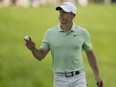 Rory McIlroy, of Northern Ireland, gestures after putting on the 17th green during the first round of the Memorial golf tournament, Thursday, June 6, 2024, in Dublin, Ohio.