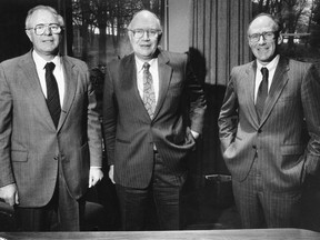 The Irving brothers, from left, John, James and Arthur are seen Nov. 7, 1987. Businessman James K. Irving has died at the age of 96.