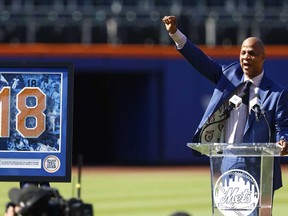 Former New York Mets outfielder Darryl Strawberry acknowledges fans during ceremony to retire his number at Citi Field, Saturday, June 1, 2024, in New York.