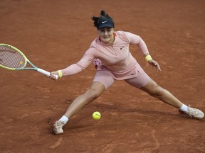 Canada's Bianca Andreescu plays a shot against Italy's Jasmine Paolini during their third round match of the French Open tennis tournament at the Roland Garros stadium in Paris, Saturday, June 1, 2024. Andreescu advanced to her first quarterfinal of the tennis season Wednesday with a 6-4, 6-4 win over Yue Yuan in second-round action at the Libema Open.