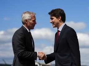 Prime Minister Justin Trudeau is greeted by Canadian ambassador to Switzerland Patrick Wittmann as he arrives in Zurich, Switzerland on Saturday, June 15, 2024. Trudeau will be attending the Ukraine peace summit.