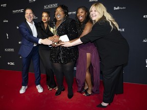 The cast and crew of "Bria Mack Gets a Life" pose with their award for Best Comedy Series at the 2024 Canadian Screen Awards Gala in Toronto, on Friday May 31, 2024.