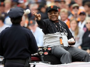 Baseball Hall-of-Famer Willie Mays of the San Francisco Giants throws out baseballs after being honoured prior to the 78th Major League Baseball All-Star Game on July 10, 2007 in San Francisco.