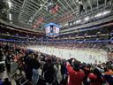 Fans watch as the Ottawa Senators and Edmonton Oilers take part in the pregame skate before an NHL game at the Canadian Tire Centre in Ottawa.