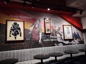 The Hard Rock Club inside the Canadian Tire Centre in Ottawa features memorabilia from Canadian musicians Justin Bieber, Bryan Adams, and Ottawa’s own Alanis Morissette.