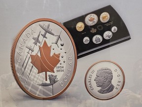 Part of a poster at the Royal Canadian Mint building in Ottawa shows 2024 coins which include King Charles.