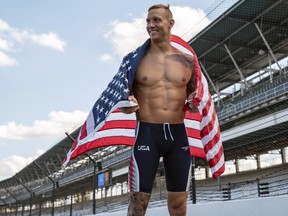 Caeleb Dressel poses at Indianapolis Motor Speedway for a Speedo photoshoot.