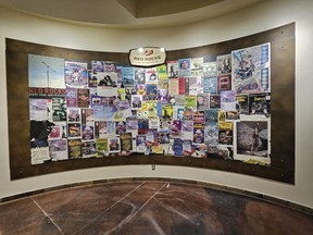 Concert posters related to Red Rocks Amphitheatre are displayed on a wall at its Visitors Center.