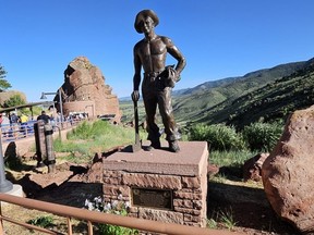 A statue commemorates the Civilian Conservation Corps workers who helped to prepare the seating area of Red Rocks Amphitheatre from 1936 to 1941.