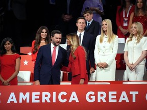 Republican vice presidential candidate, U.S. Sen. J.D. Vance (R-OH) speaks with former first lady Melania Trump on the fourth day of the Republican National Convention at the Fiserv Forum on July 18, 2024 in Milwaukee, Wisconsin.
