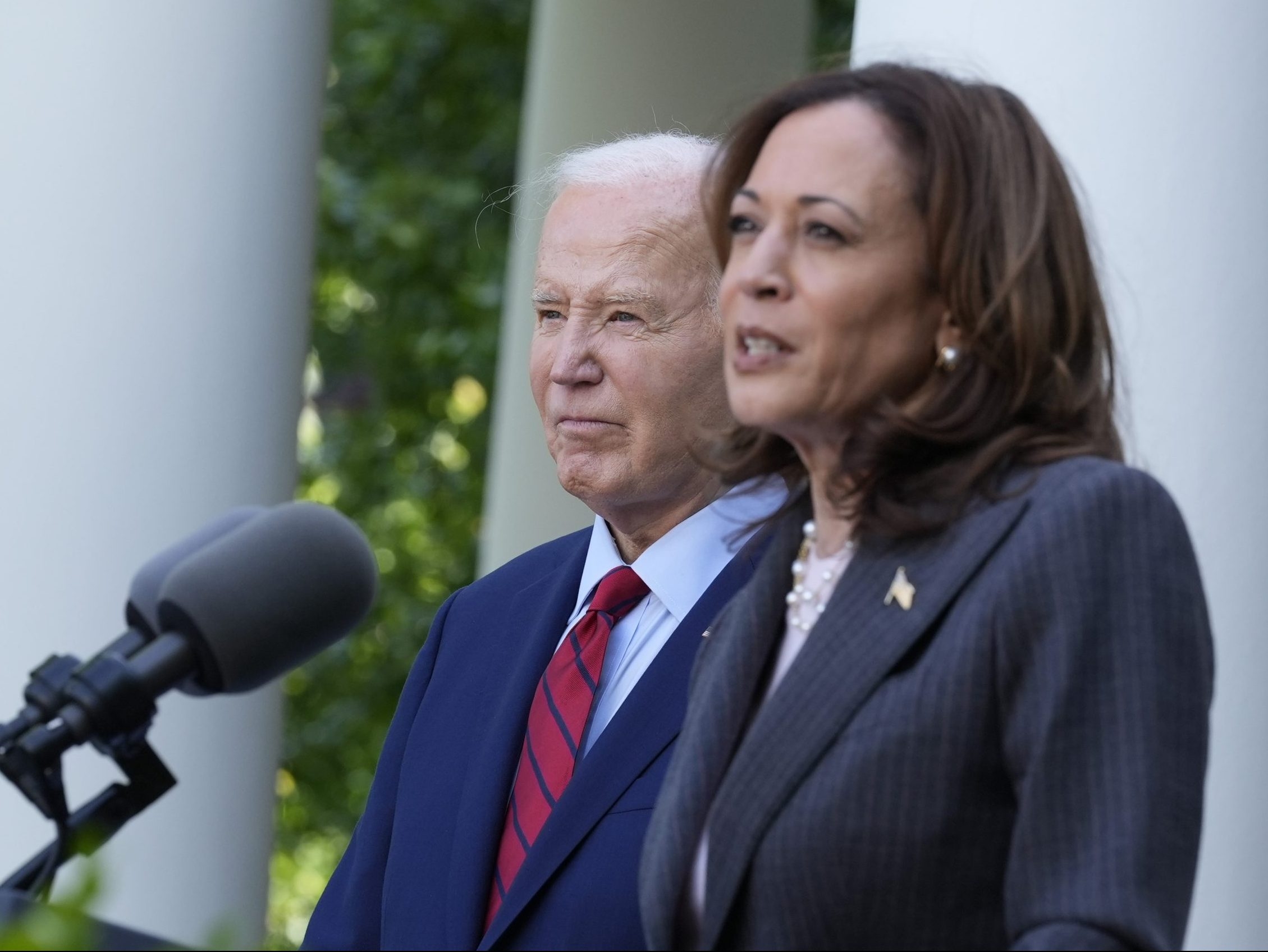  U.S. President Joe Biden listens as Vice-President Kamala Harris speaks in the Rose Garden of the White House in Washington, May 13, 2024. With Biden ending his re-election bid and endorsing Harris, Democrats now must navigate a shift that is unprecedented this late in an election year. Democrats are set to hold their convention in Chicago in August.