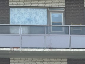 Blood is visible on a balcony