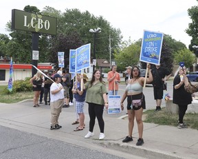 LCBO workers picket outside the LCBO location on Danforth Ave. just east of Victoria Park Ave. in Scarborough on Friday, July 5, 2024. JACK BOLAND/TORONTO SUN