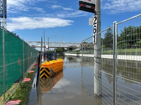 Lake Shore Blvd. W. lies flooded.