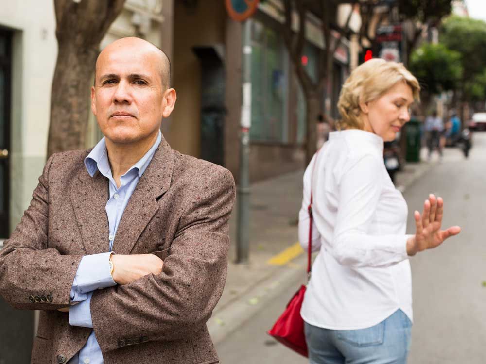 A woman seperating from her husband is considering telling their adult children about their father's affairs.