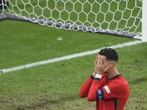 Cristiano Ronaldo dari Portugal bereaksi setelah kehilangan kesempatan mencetak gol melawan Slovenia selama pertandingan babak enam belas besar antara Portugal dan Slovenia di turnamen sepak bola Euro 2024 di Frankfurt, Jerman, Senin, 1 Juli 2024.