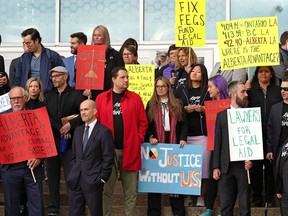 Criminal defence lawyers rallied outside the law courts in Edmonton on Friday, Sept. 23, 2022, to demand the government fix legal aid in Alberta.