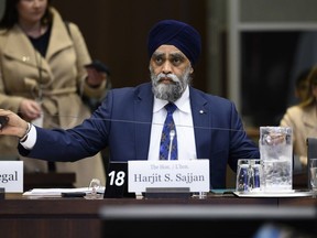 Minister of International Development Harjit Sajjan prepares to appear at the Standing Committee on Citizenship and Immigration, studying the government's response to the final report on the Special Committee on Afghanistan, in Ottawa, on Wednesday, April 26, 2023. Sajjan's office says privacy laws prevent it from divulging whether he intervened on behalf of any other particular group trying to flee Afghanistan when Kabul fell to the Taliban in 2021.