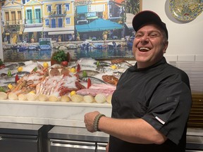 FISHER KING: Michael Manos with the day’s bounty. His brother owns the famed Manos in D Maris Bay. BRAD HUNTER/TORONTO SUN