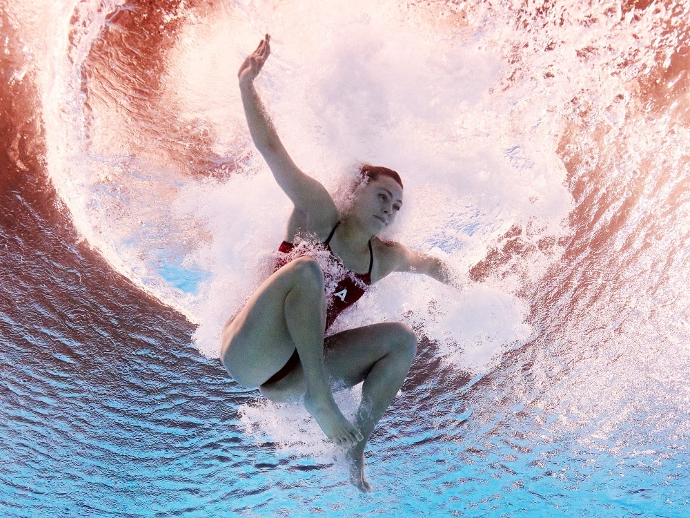 Alison Gibson of Team United States competes in the Women's 3m Springboard Preliminaries at the Olympic Games.