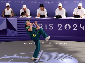 B-Girl Raygun of Team Australia competes during the B-Girls Round Robin - Group B on day fourteen of the Olympic Games Paris 2024 at Place de la Concorde on August 09, 2024 in Paris, France.