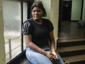 Mia Hall, 14, poses for a portrait in her neighborhood park on Thursday, Aug. 29, 2024, in Bronx borough of New York.